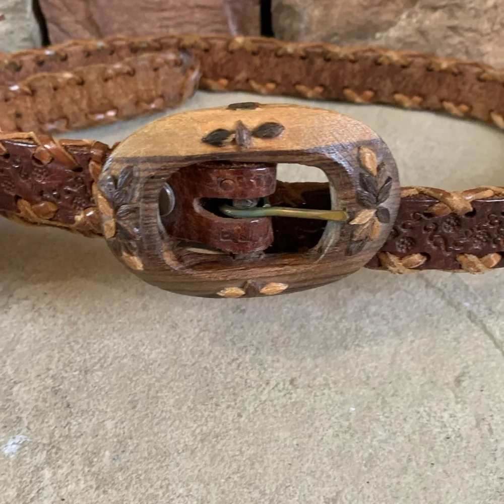 Leather tooled size small belt with wooden buckle